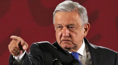Ata AMLO las manos de funcionarios ante campa&ntilde;as