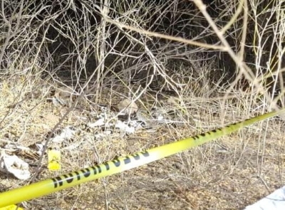 Con el rostro encintado con pl&aacute;stico hallan a un ejecutado en el Campo Cuba en la sindicatura de Costa Rica