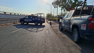 Un hombre ejecutado es colgado en el puente de La Costerita