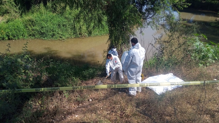 Semienterrado, localizan el cad&aacute;ver de una persona, a orillas del r&iacute;o en Bachiguato, Culiac&aacute;n