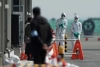 Evacuan a ciudadanos confinados en crucero en Jap&oacute;n